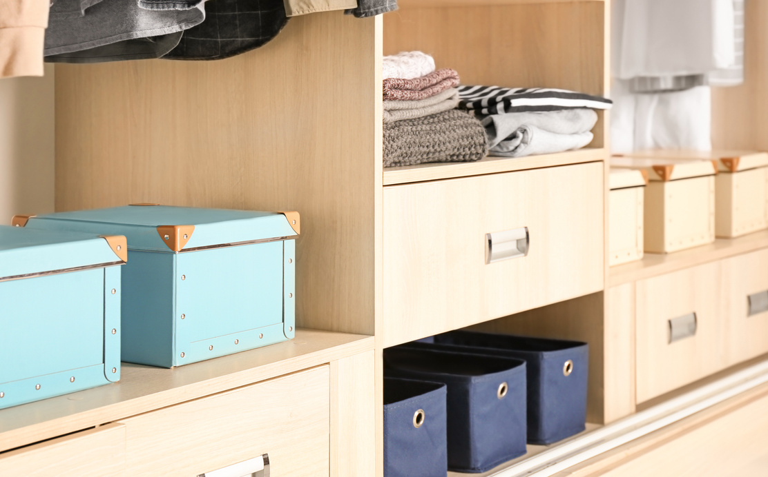 Organized Wardrobe Closet with Boxes